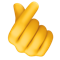 Hand with Index Finger and Thumb Crossed emoji on Facebook